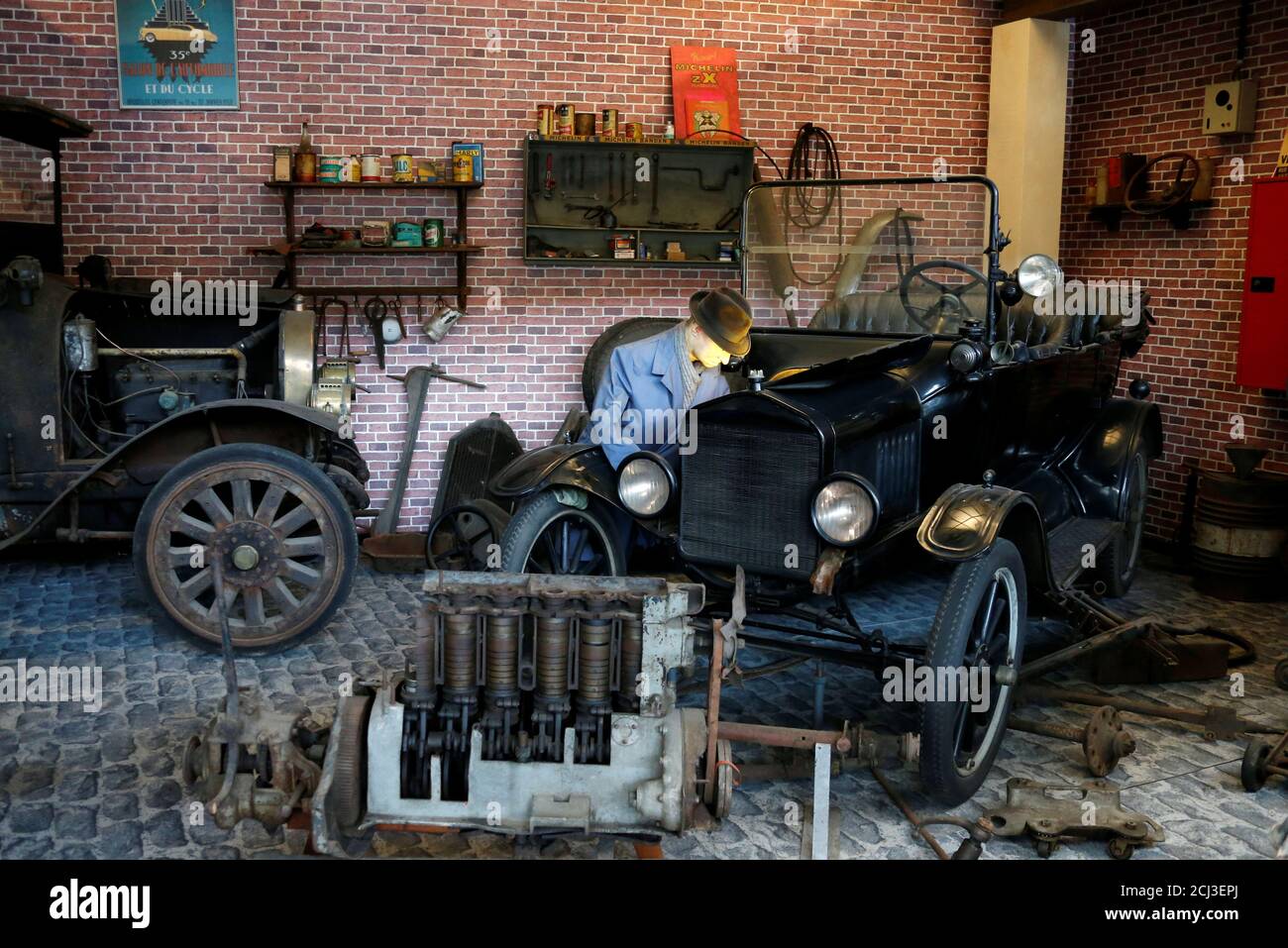 A 1921 Ford Model T Car And An Old Repair Shop Are Displayed At The Autoworld Museum In Brussels Belgium May 29 2017 Picture Taken May 29 2017 Reuters Francois Lenoir Stock Photo Alamy