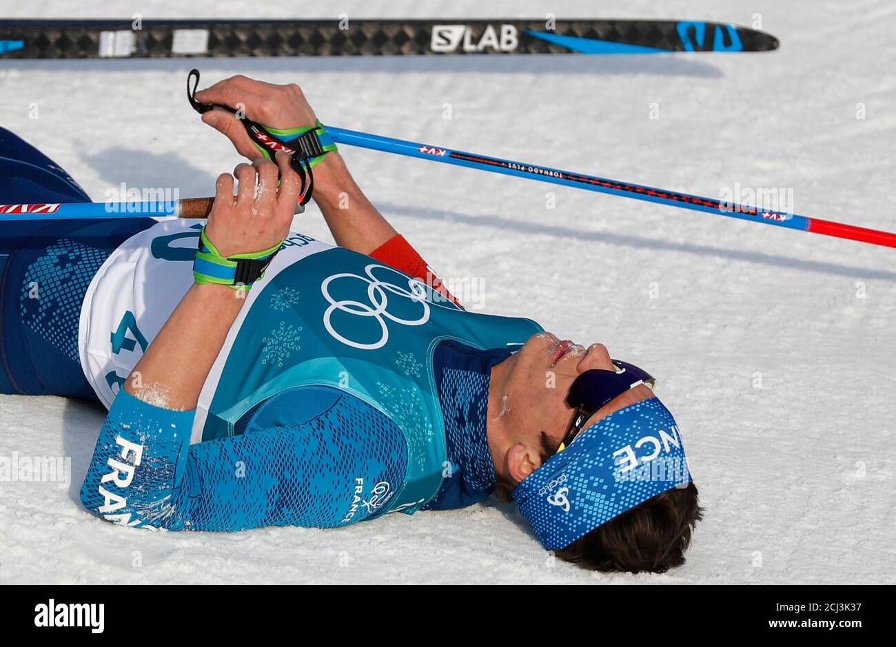 Cross-Country Skiing – Pyeongchang 2018 Winter Olympics – Men's 15km Free – Alpensia Cross-Country Skiing Centre – Pyeongchang, South Korea – February 16, 2018 - Clement Parisse of France reacts after crossing the finish line. REUTERS/Murad Sezer Stock Photo
