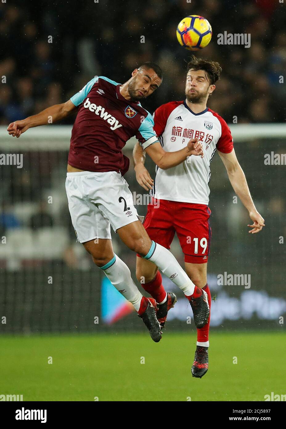 Soccer Football - Premier League - West Ham United vs West Bromwich Albion - London Stadium, London, Britain - January 2, 2018   West Ham United's Winston Reid in action with West Bromwich Albion's Jay Rodriguez   REUTERS/Eddie Keogh    EDITORIAL USE ONLY. No use with unauthorized audio, video, data, fixture lists, club/league logos or 'live' services. Online in-match use limited to 75 images, no video emulation. No use in betting, games or single club/league/player publications.  Please contact your account representative for further details. Stock Photo