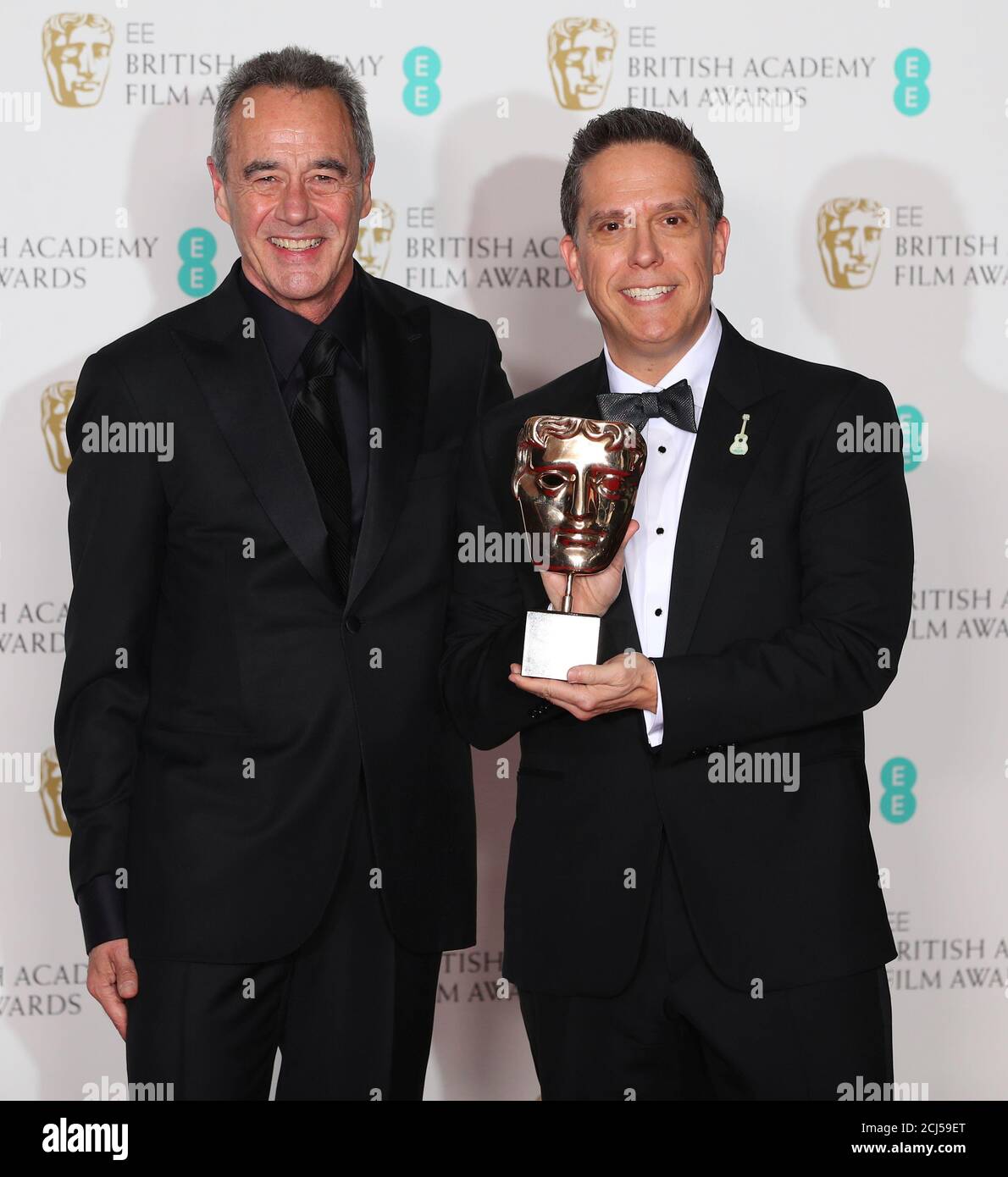 Jim Morris and Lee Unkrich, hold their awards for Best Animated Film award  for 'Coco' at the British Academy of Film and Television Awards (BAFTA) at  the Royal Albert Hall in London,