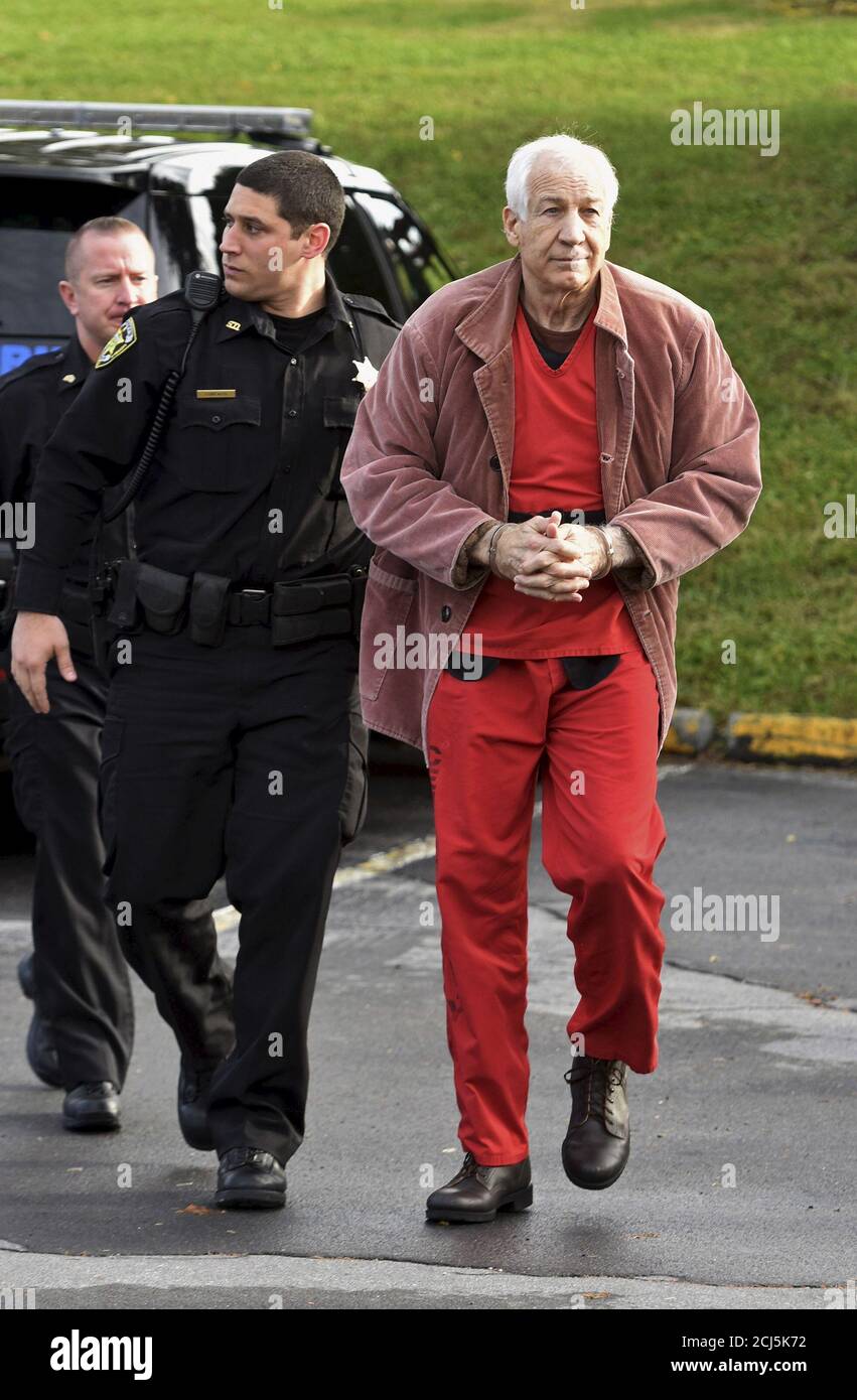 Convicted child molester Jerry Sandusky (R), a former assistant football  coach at Penn State University, arrives at the Centre County Courthouse in  Bellefonte, Pennsylvania October 29, 2015. Sandusky, 71, returned to court