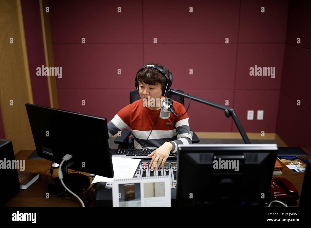 Kim Chung-seong, a North Korean defector and a Christian missionary,  prepares a radio broadcast at a radio station in Seoul, South Korea, April  21, 2016. REUTERS/Kim Hong-Ji Stock Photo - Alamy