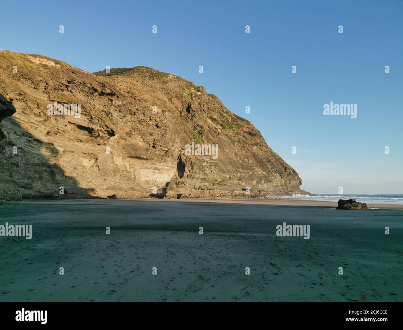Tokatu Loop Track Beautiful view of Tokatu head from the beach in the evening light Stock ...