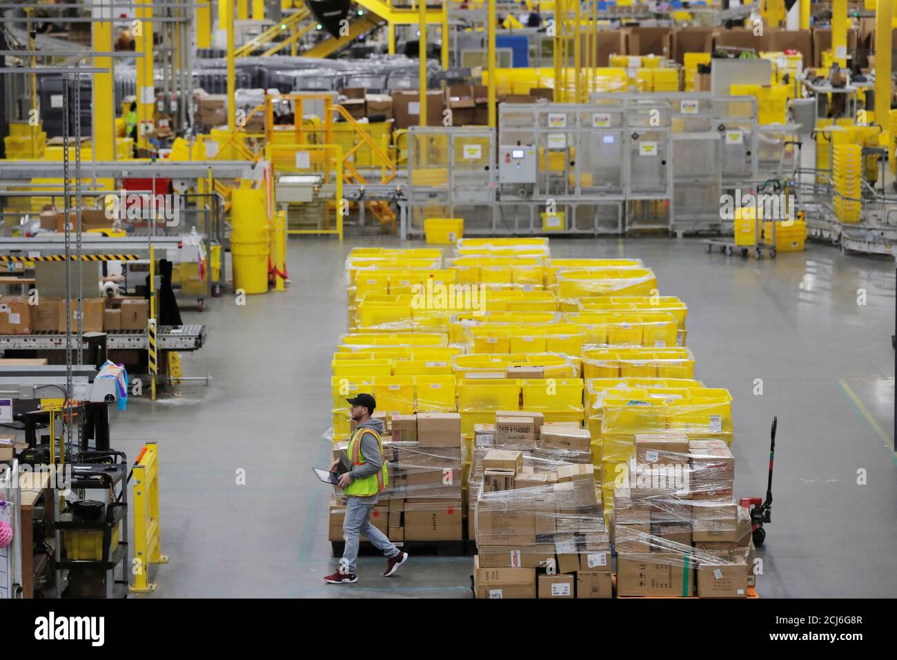 Amazon fulfillment center workers hires stock photography and images