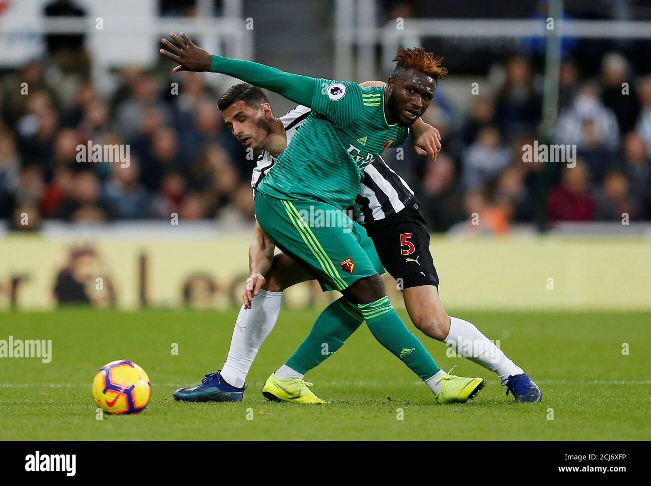 Soccer Football Premier League Newcastle United V Watford St James Park Newcastle Britain November 3 2018 Watford S Isaac Success In Action With Newcastle United S Fabian Schar Action Images