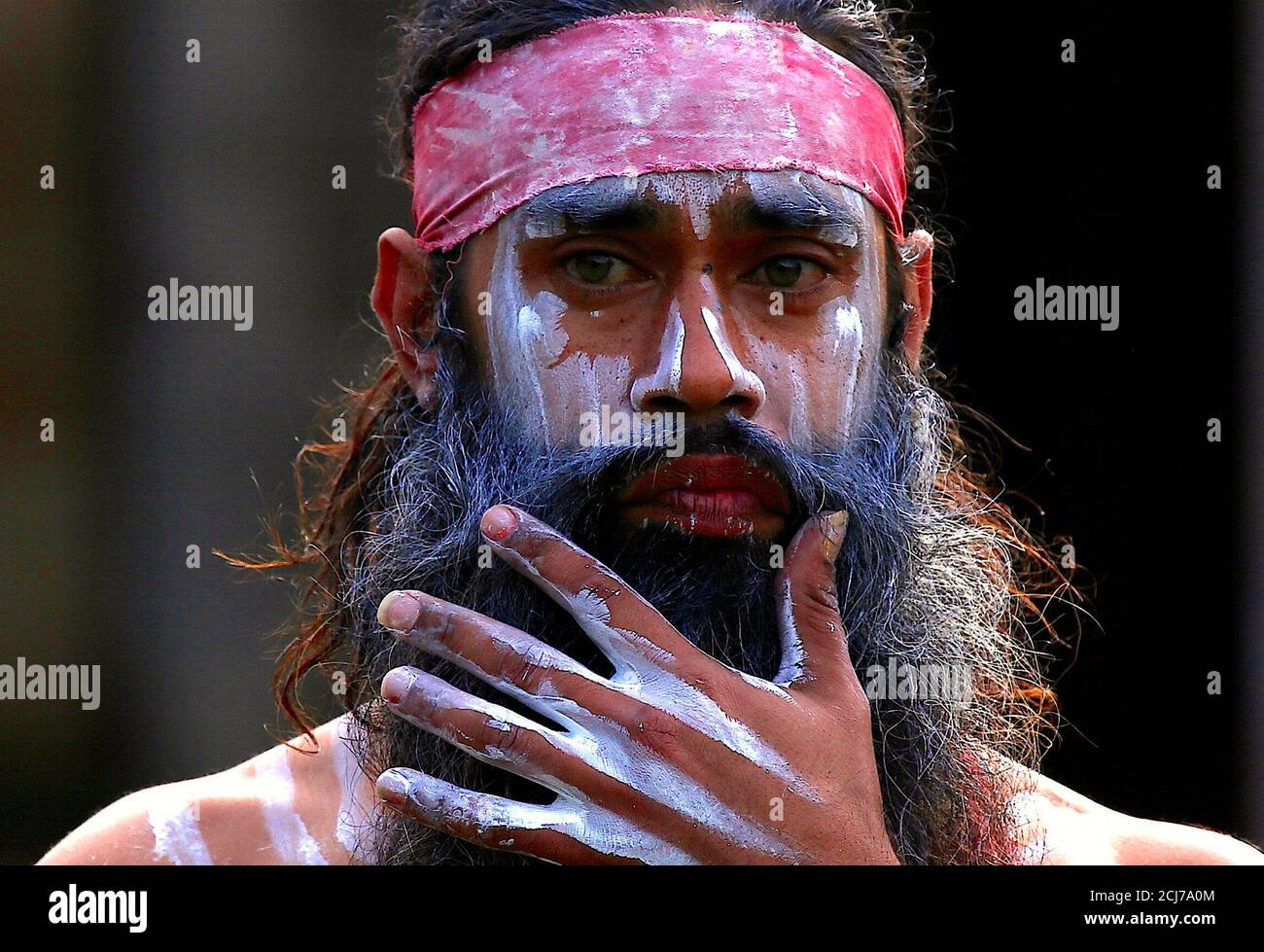 An Australian Aboriginal wearing traditional dress prepares to perform welcoming ceremony at Government House in Sydney, Australia, June 28, 2017. REUTERS/David Gray Stock Photo - Alamy