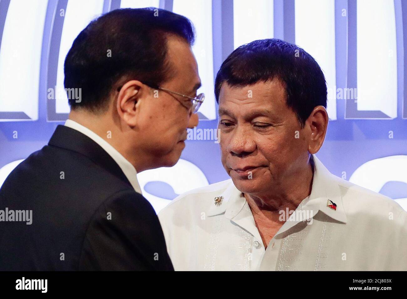 Chinese Premier Li Keqiang (L) and Philippine President Rodrigo Duterte (R) before the opening ceremony of the 31st Association of Southeast Asian Nations (ASEAN) Summit in Manila, Philippines November 13, 2017. The Philippines is hosting the 31st Association of Southeast Asian Nations (ASEAN) Summit and Related Meetings from 10 to 14 November. REUTERS/Mark Cristino/Pool Stock Photo