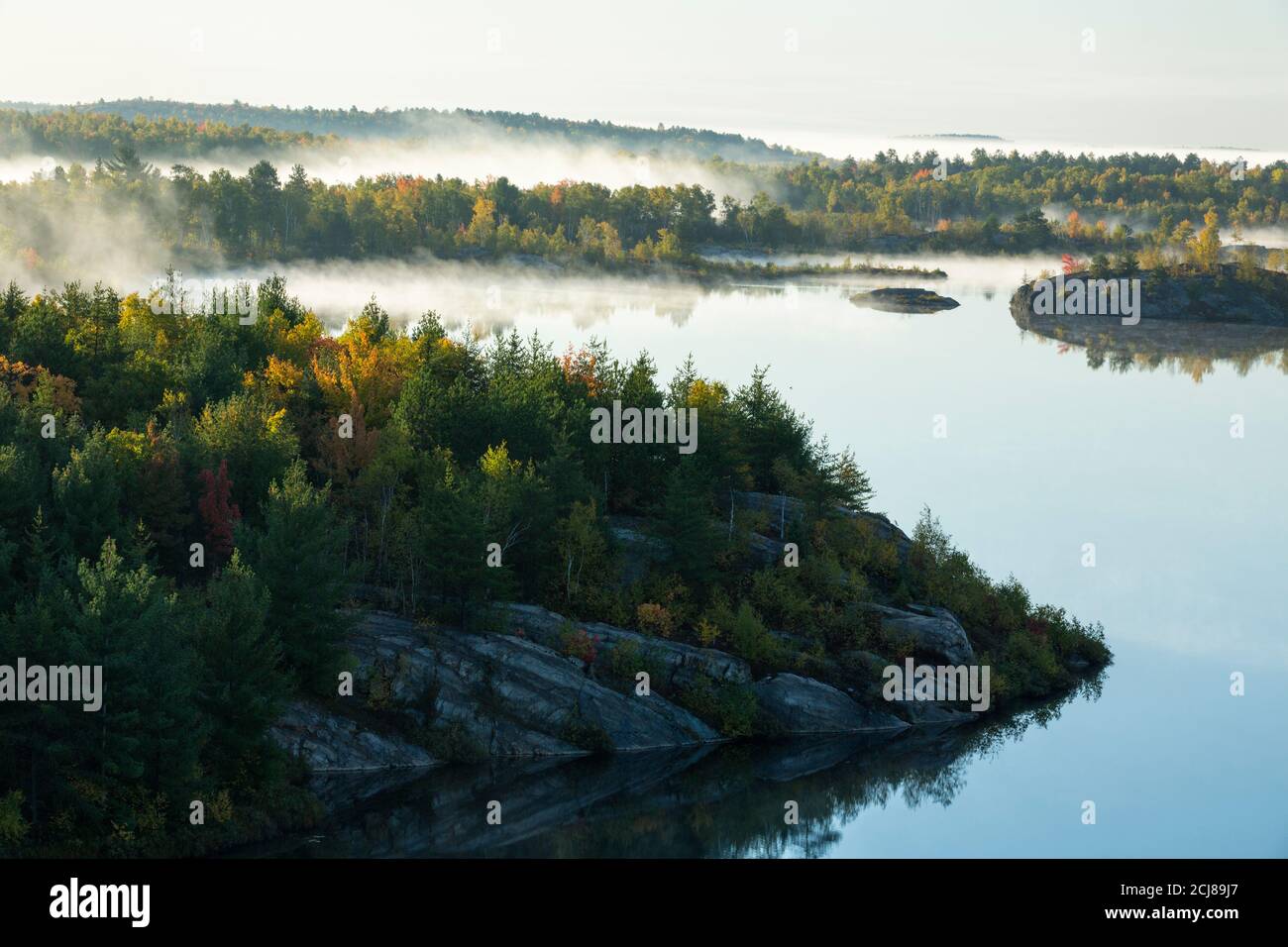 Fog patches, autumn morning, Lake Laurentian Conservation Area, Sudbury, Ontario, Canada. Stock Photo