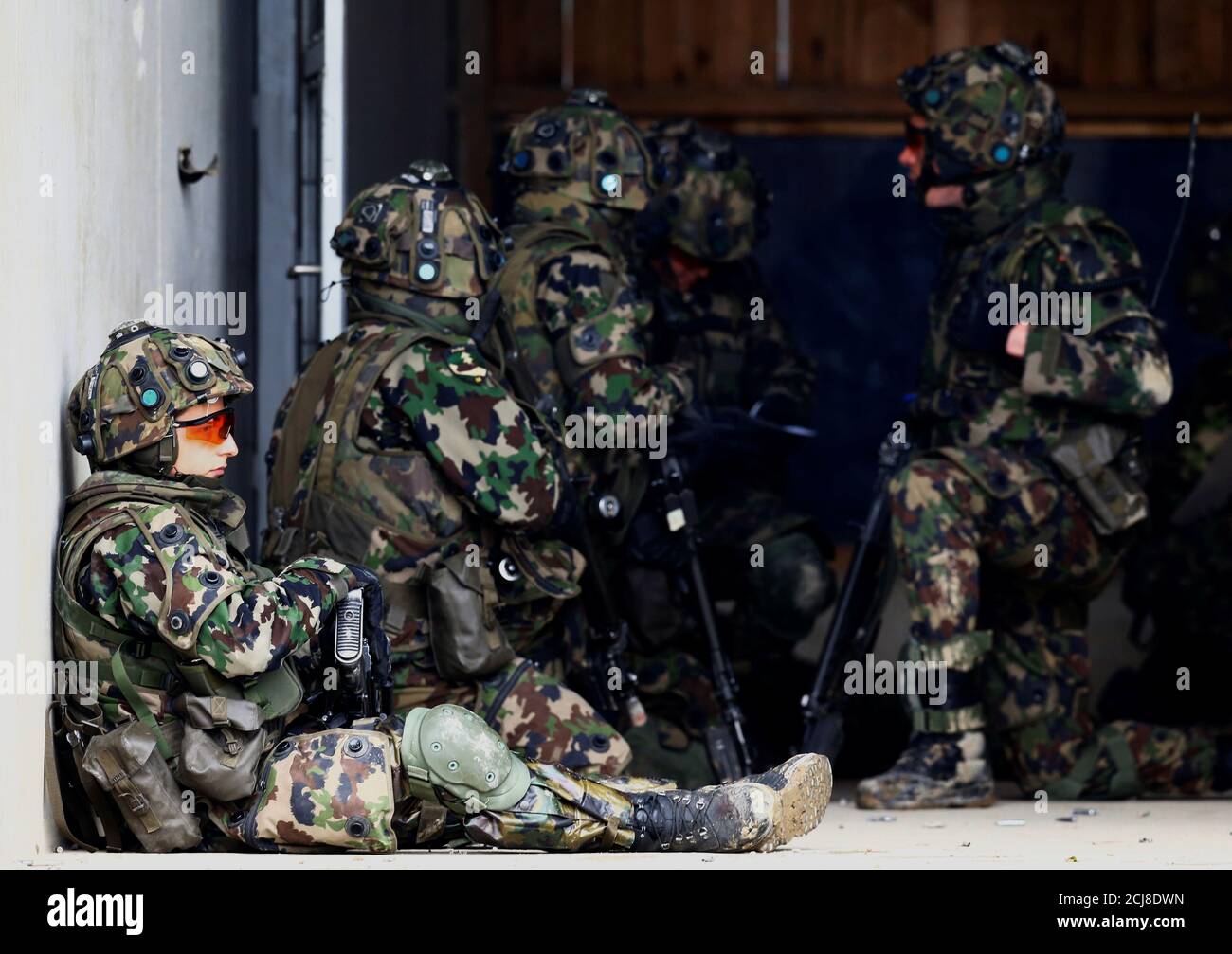 Swiss army soldiers with Laser Simulation equipment (LASSIM) take part in a  tactical exercise made during Swiss defence equipment provider RUAG media  day at the Swiss army base in Bure, Switzerland April