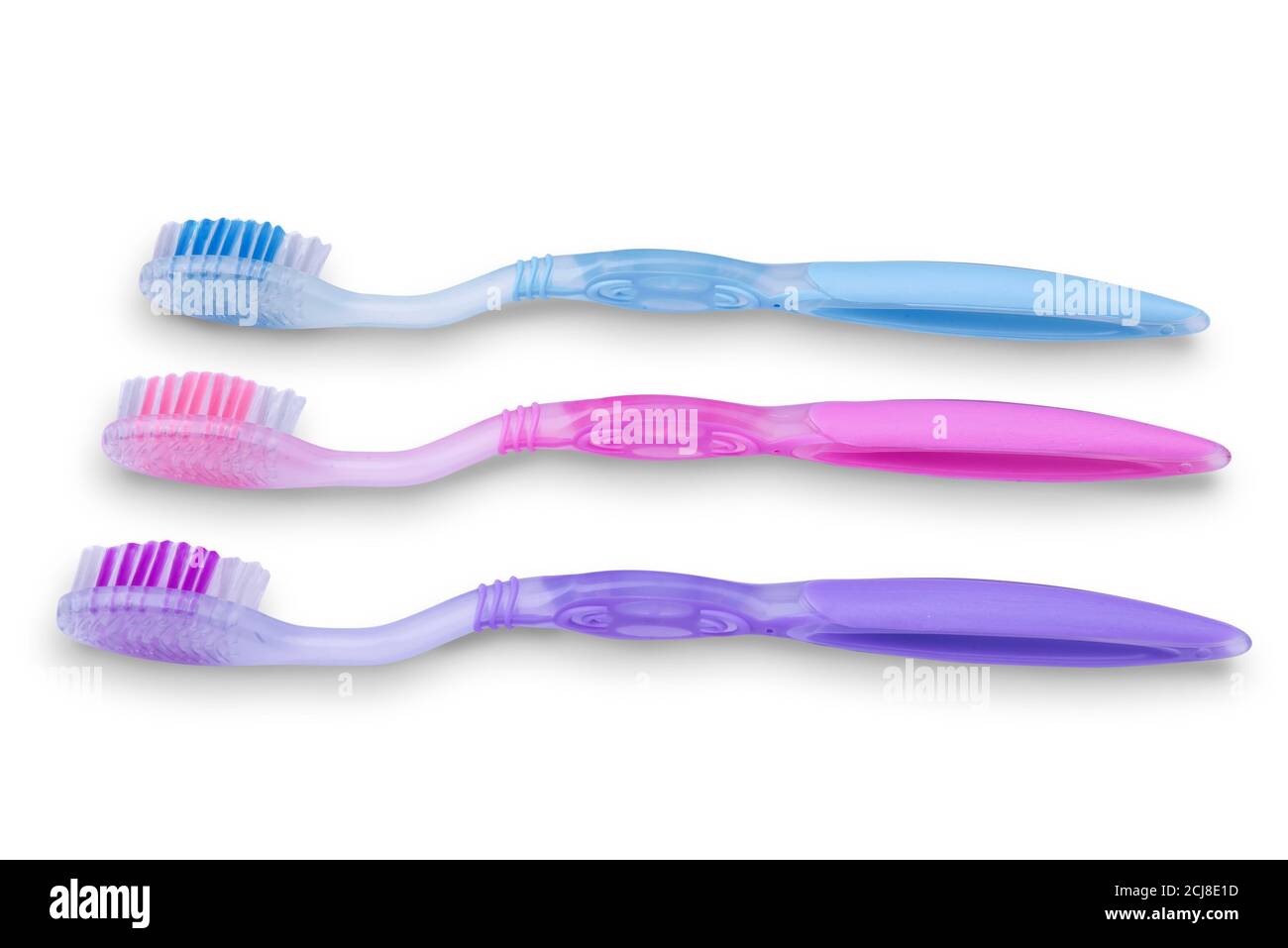 Set of colorful toothbrushes isolated over white background Stock Photo ...