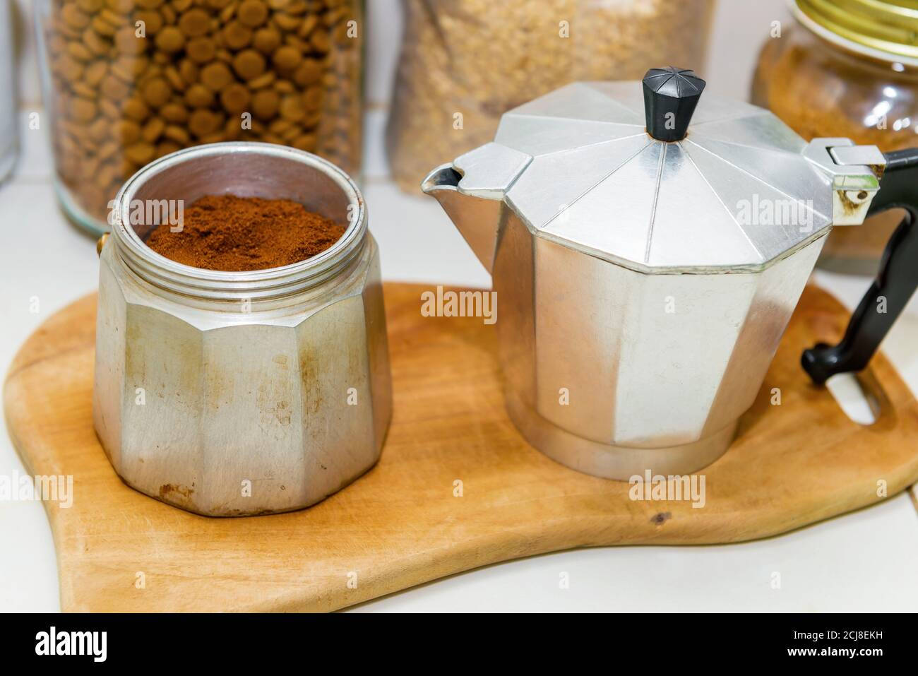 Old coffee maker with coffee powder on the table Stock Photo - Alamy