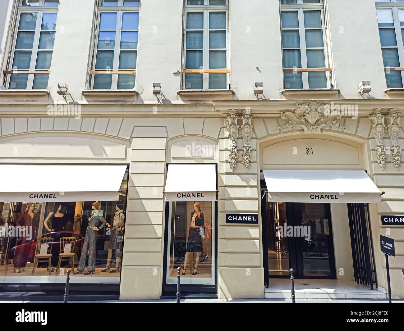Siege stribe Pearly facade of the Chanel store in Paris Stock Photo - Alamy