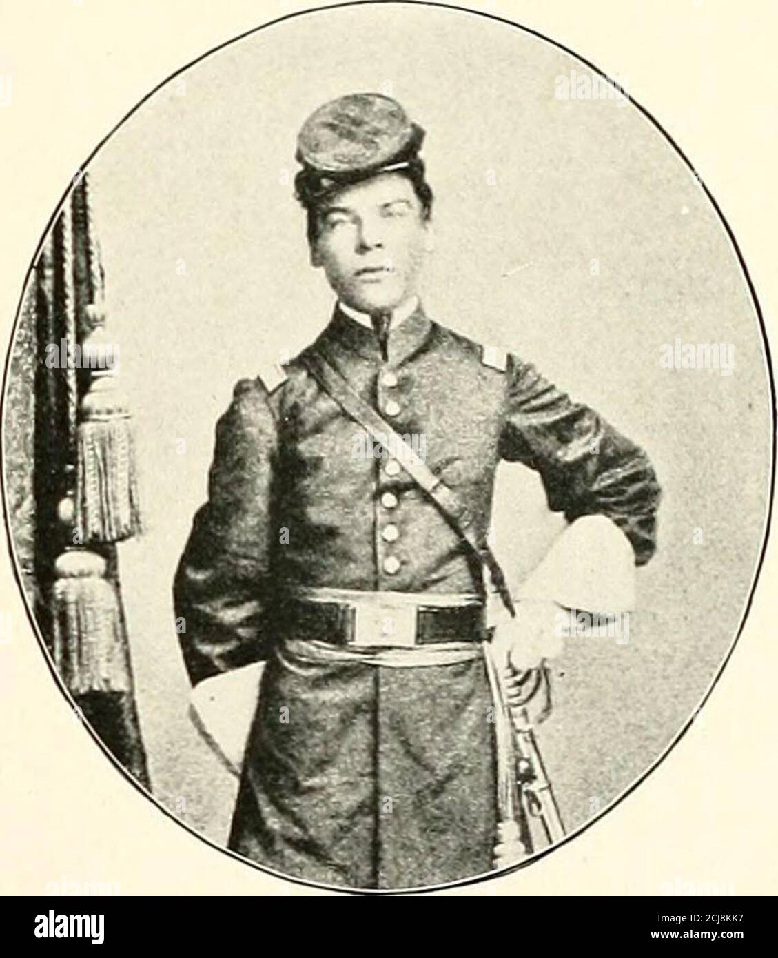 The photographic history of the Civil War : in ten volumes . Private Geo.  L. Kilmer in (U, Wearing the Veteran Stripe at 18 (Military Editor). Private  J. E. Gihnan, Lo.sl