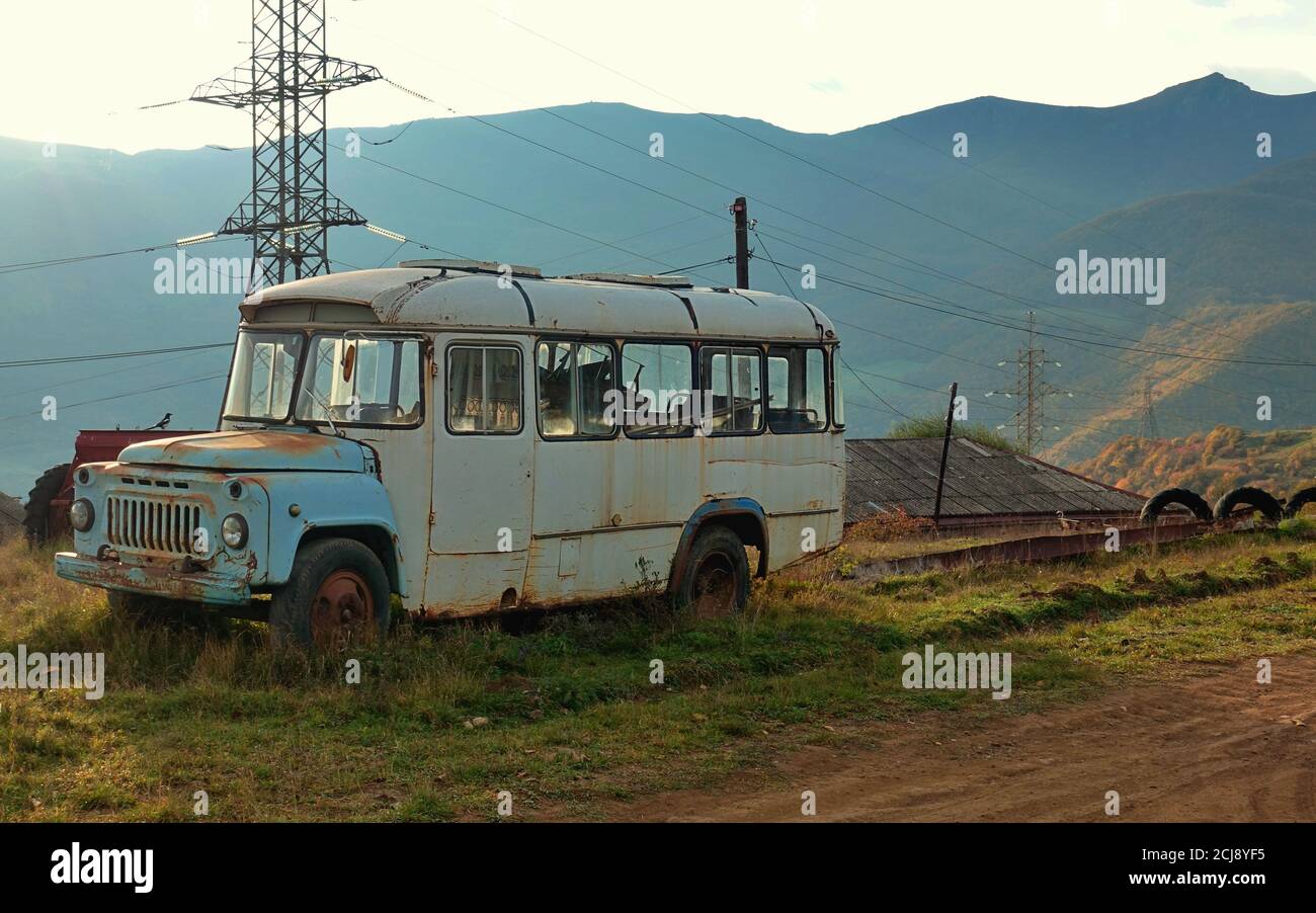 Old Soviet style bus in the countryside of Armenia Stock Photo