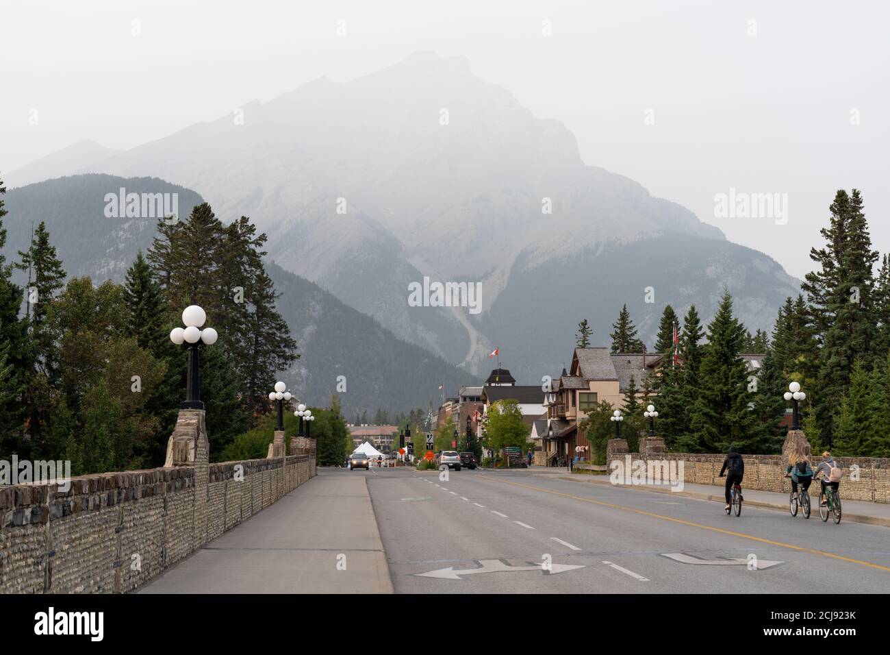 Downtown Banff Avenue as a haze. Smoke from the forest wildfires. Poor air quality. Stock Photo