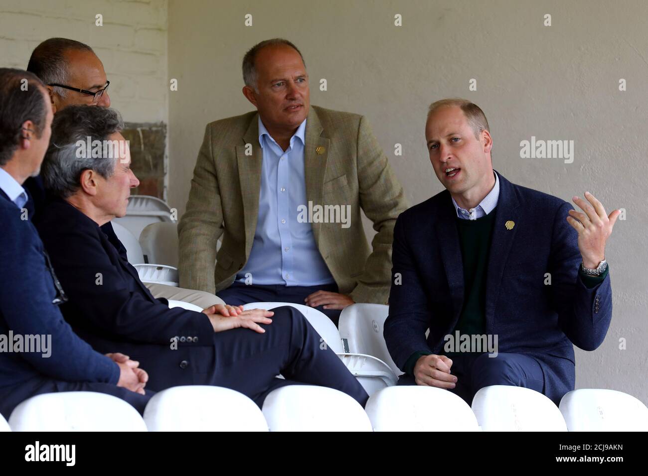 Britain's Prince William, Duke of Cambridge gestures as he speaks to Rob Morris, Co-Owner of Silver Jubilee Park and Vice President of Hendon F.C. and Edgware Town F.C., and club officials during his visit to Hendon FC, as part of the Heads Up mental health campaign at Hendon F.C., in London, Britain September 6, 2019. Tim P. Whitby/Pool via REUTERS Stock Photo
