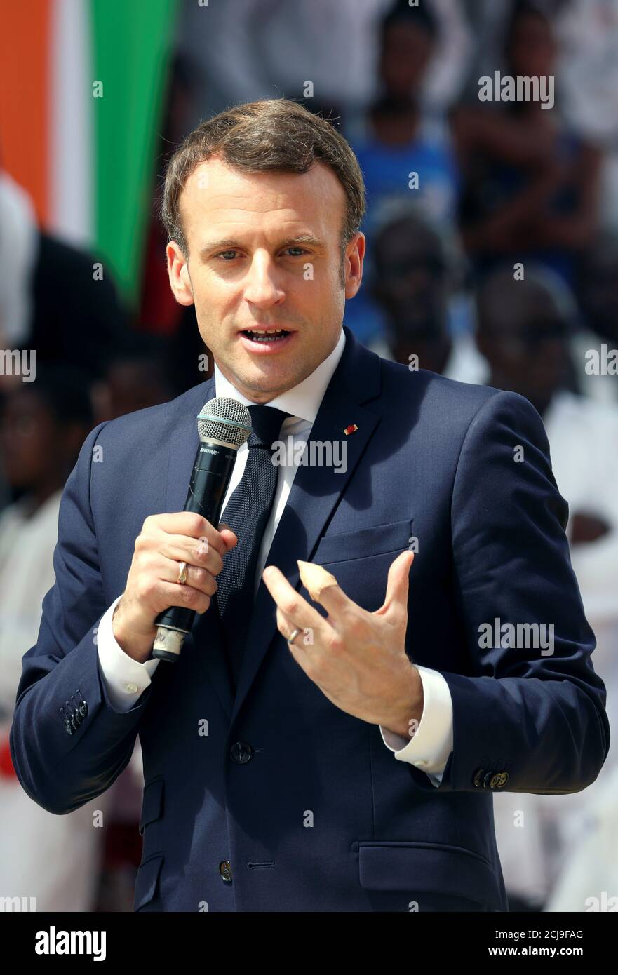 France's President Emmanuel Macron speaks during the inauguration of the Agora "win win" in Koumassi, Abidjan, Ivory Coast December 21, 2019. REUTERS/Luc Gnago Stock Photo
