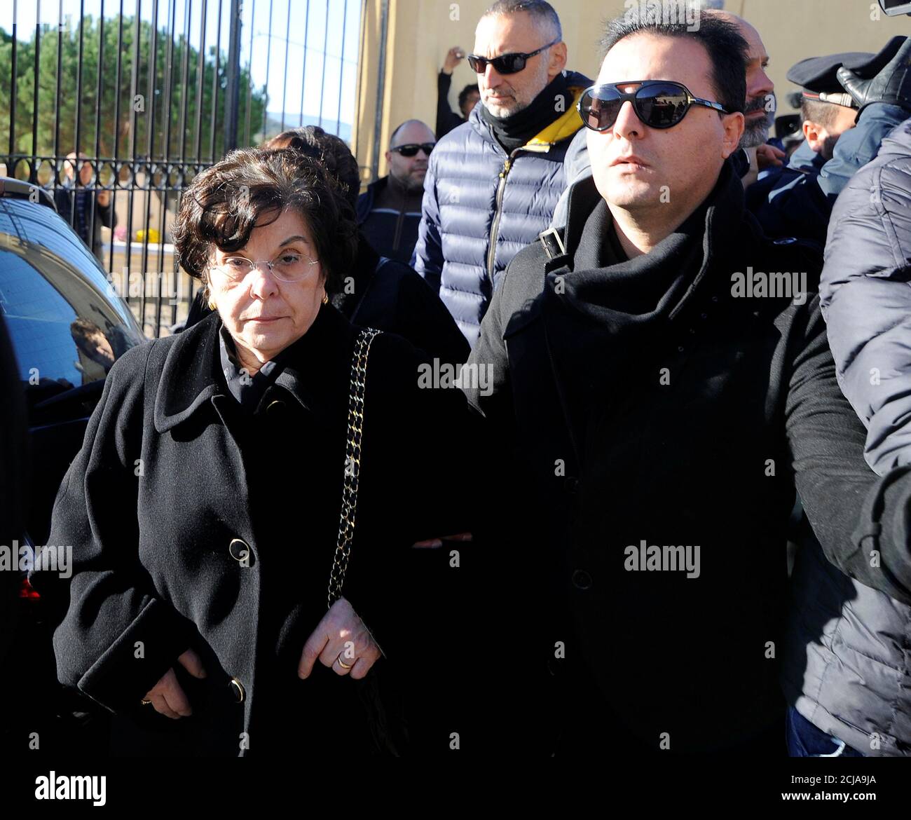Toto Riina's wife Ninetta Bagarella and his son Salvo leave the cemetery  after the funeral in Corleone, Italy November 22, 2017. REUTERS/Guglielmo  Mangiapane Stock Photo - Alamy