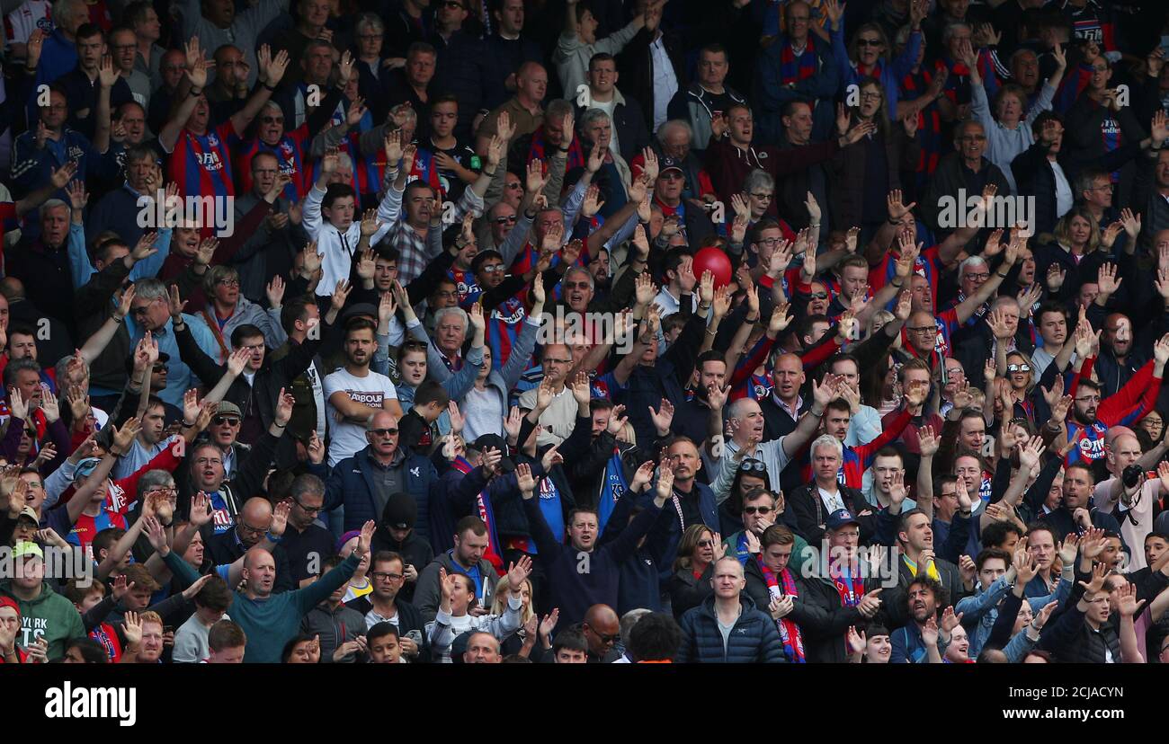 Soccer Football - Premier League - Crystal Palace vs West Bromwich Albion - Selhurst Park, London, Britain - May 13, 2018   Crystal Palace fans celebrate after the match    REUTERS/Hannah McKay    EDITORIAL USE ONLY. No use with unauthorized audio, video, data, fixture lists, club/league logos or "live" services. Online in-match use limited to 75 images, no video emulation. No use in betting, games or single club/league/player publications.  Please contact your account representative for further details. Stock Photo