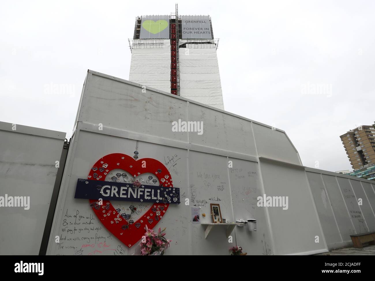 New hoarding covers the top of Grenfell Tower to mark the first anniversary of the fire that killed 71 people at the social housing tower block in west London, June 8, 2018. REUTERS/Simon Dawson Stock Photo