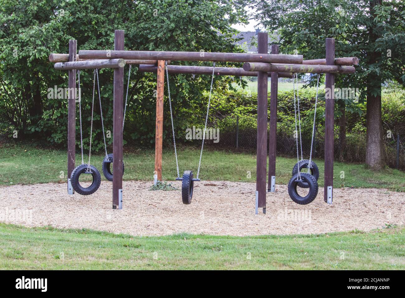 Large tire swing in a playground Stock Photo Alamy