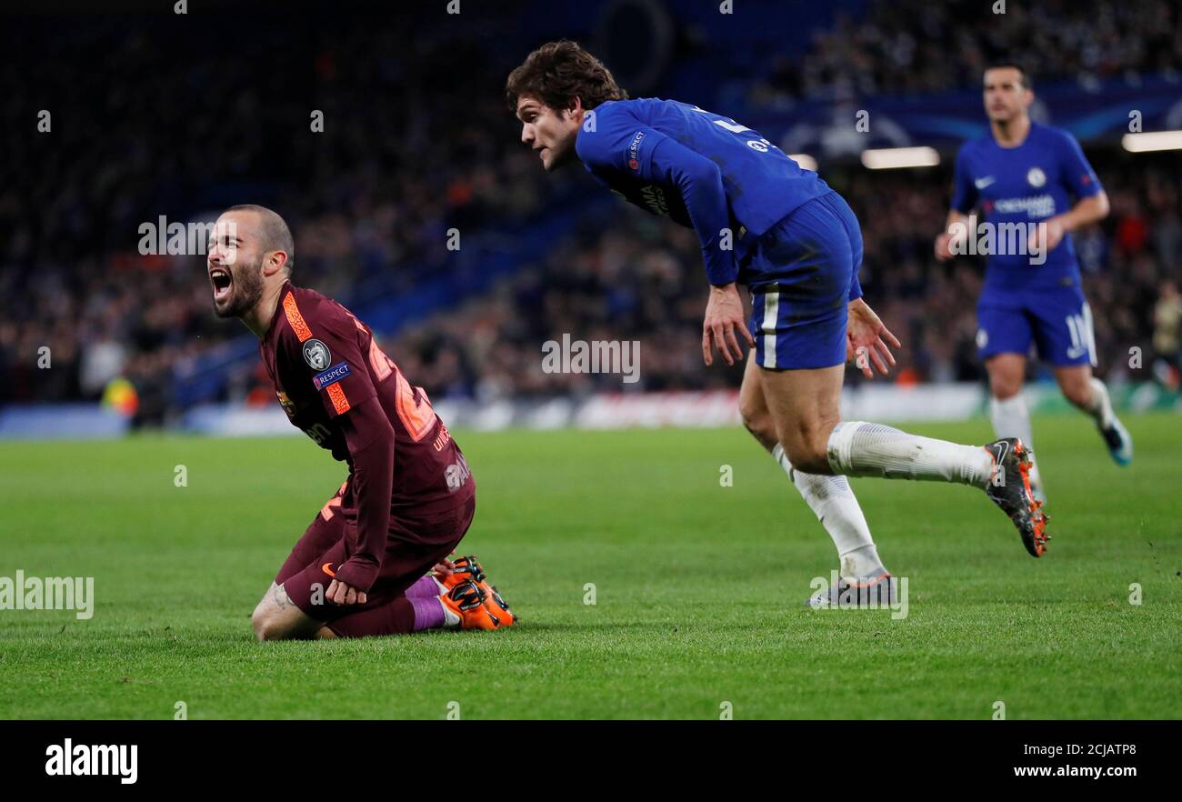 Soccer Football - Champions League Round of 16 First Leg - Chelsea vs FC Barcelona - Stamford Bridge, London, Britain - February 20, 2018   Barcelona’s Aleix Vidal reacts as Chelsea's Marcos Alonso looks on   REUTERS/Eddie Keogh Stock Photo
