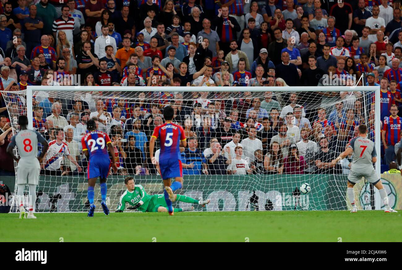 Soccer Football - Premier League - Crystal Palace v Liverpool - Selhurst Park, London, Britain - August 20, 2018 Liverpool's James Milner scores their first goal from the penalty spot REUTERS/Eddie Keogh EDITORIAL USE ONLY. No use with unauthorized audio, video, data, fixture lists, club/league logos or "live" services. Online in-match use limited to 75 images, no video emulation. No use in betting, games or single club/league/player publications. Please contact your account representative for further details. Stock Photo