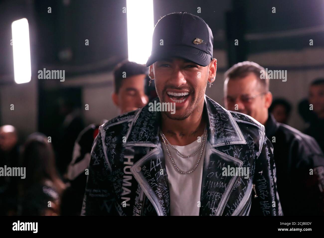 Paris Saint Germain soccer star Neymar attends a fashion show by designer  Olivier Rousteing as part of his Fall/Winter 2019-2020 collection show for  fashion house Balmain during Men's Fashion Week in Paris,