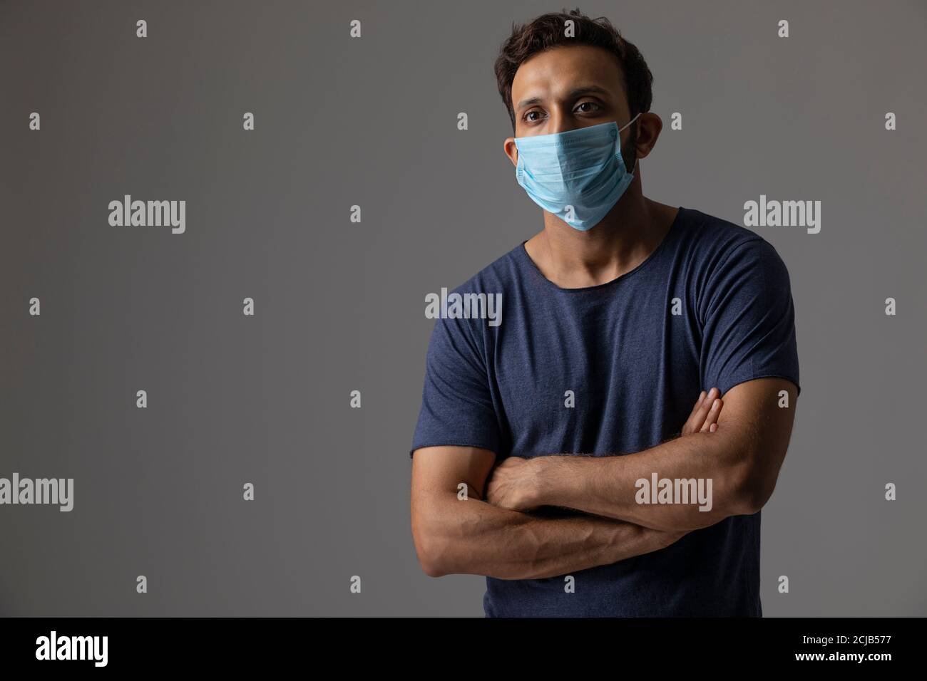 Young asian man wearing grey hi-res stock photography and images - Alamy