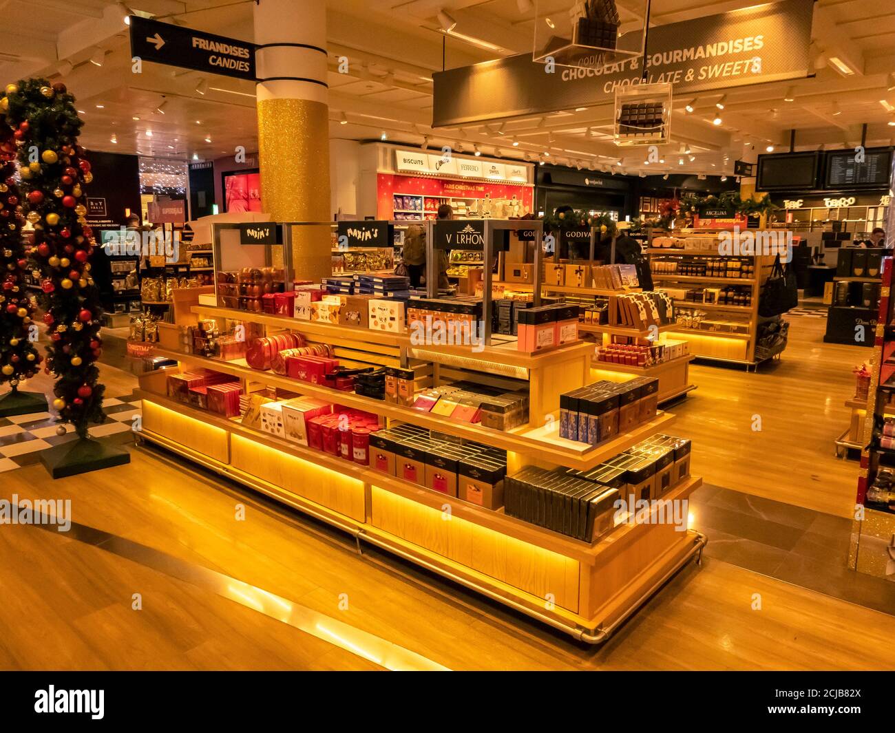 Paris, France - september 18, 2020 . Maxim's products on sale in duty free shop at Paris airport, France. Famous brand of food, french landmark Stock Photo
