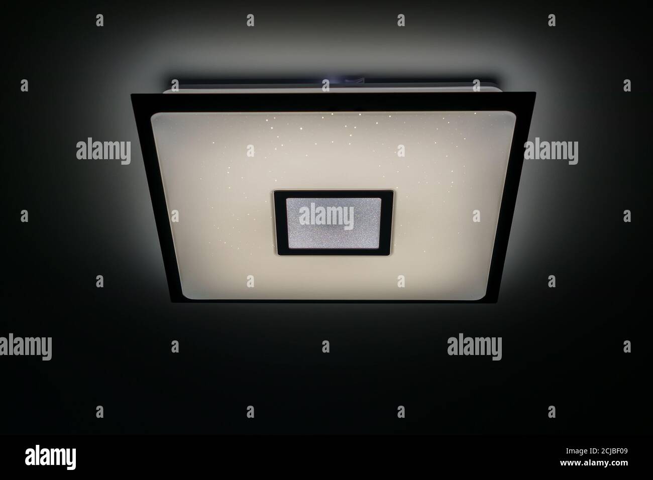 Modern luxuary square ceiling lamp with lights on Stock Photo