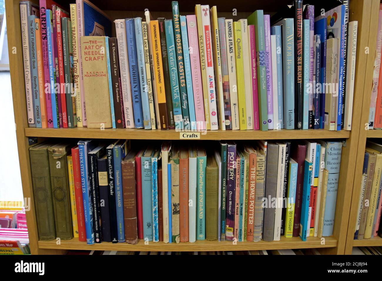 A bookshelf full of secondhand books on crafts in a Leominster Antiques  Centre Stock Photo - Alamy