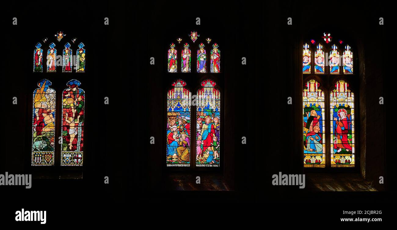 Stained glass wimdows on the south transept wall in the norman built