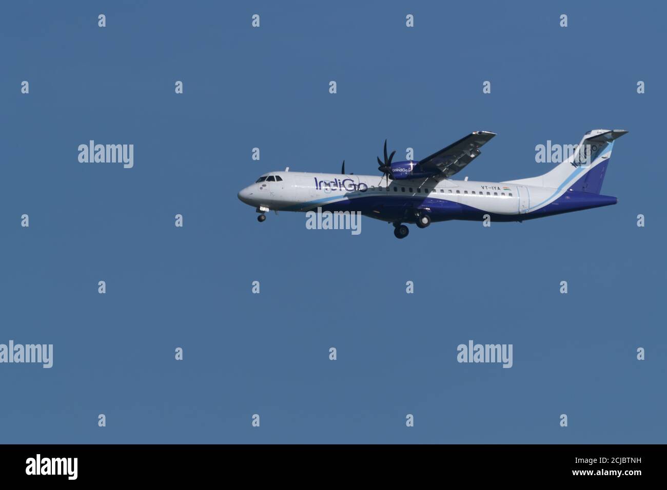 An Indigo Airlines aircraft - an ATR 72, is about to be landing at the Mangalore International Airport in Mangalore, India. Stock Photo