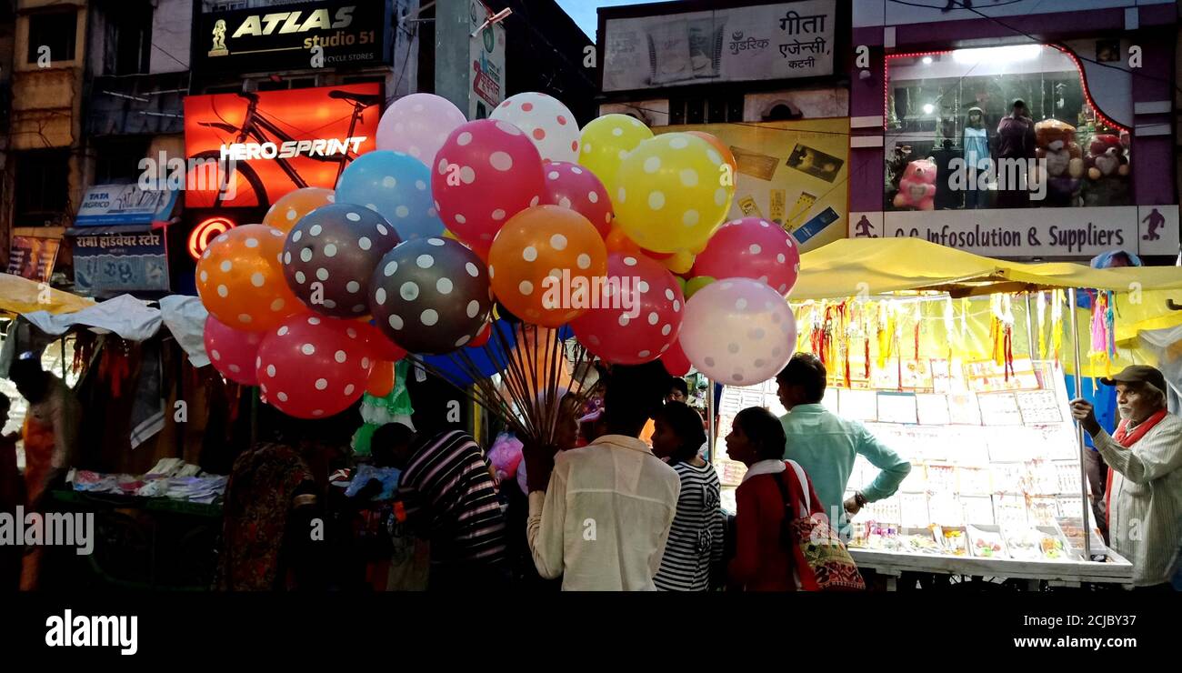 DISTRICT KATNI, INDIA - AUGUST 14, 2019: Asian vender selling air ...