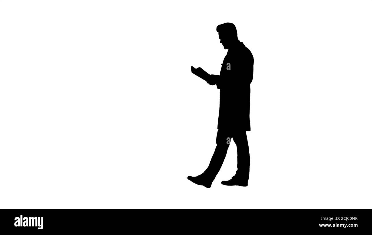 https://c8.alamy.com/comp/2CJC0NK/silhouette-concentrated-medical-doctor-reading-documentation-while-walking-2CJC0NK.jpg