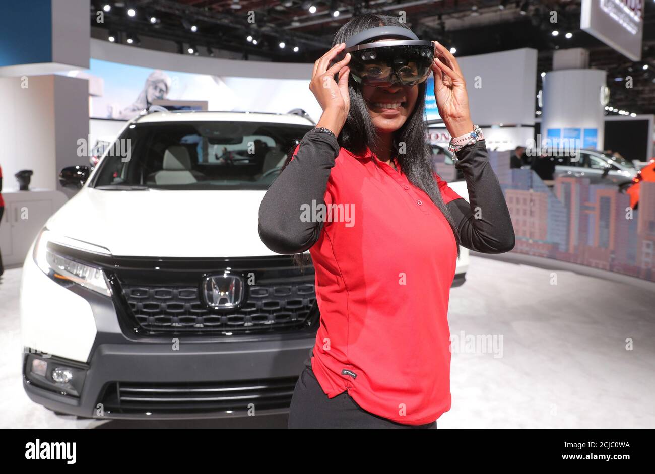 Brand ambassador Jae Johnson uses a 'Honda Lens' equipped with augmented reality for information on the Honda Passport SUV at the North American International Auto Show in Detroit, Michigan, U.S., January 15, 2019. REUTERS/Rebecca Cook Stock Photo