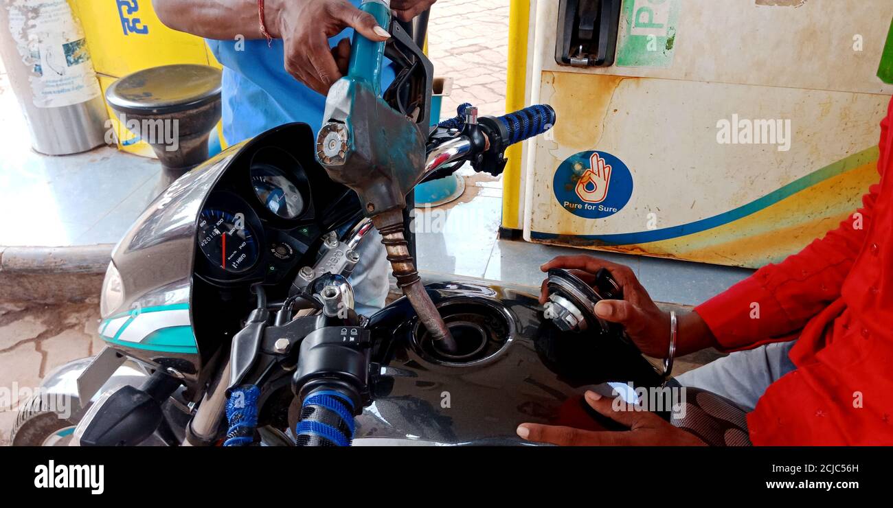 DISTRICT KATNI, INDIA - SEPTEMBER 04, 2019: Indian fuel pump male ...