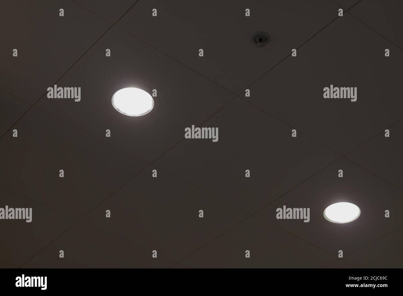 Modern layered ceiling with embedded lights Stock Photo Alamy