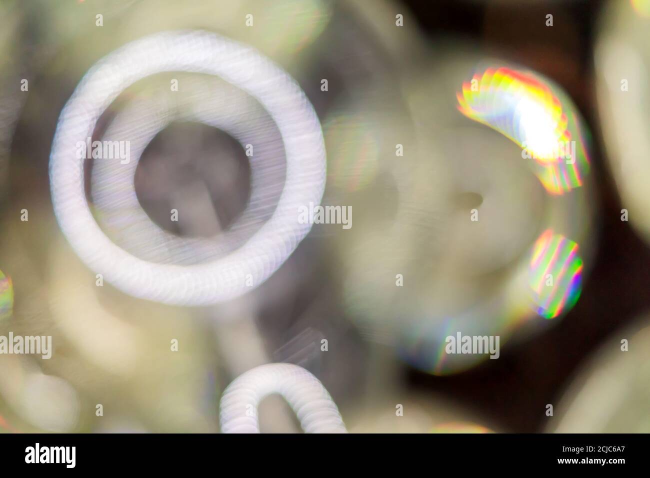 Abstract bokeh lights, bluring circles on dark background Stock Photo