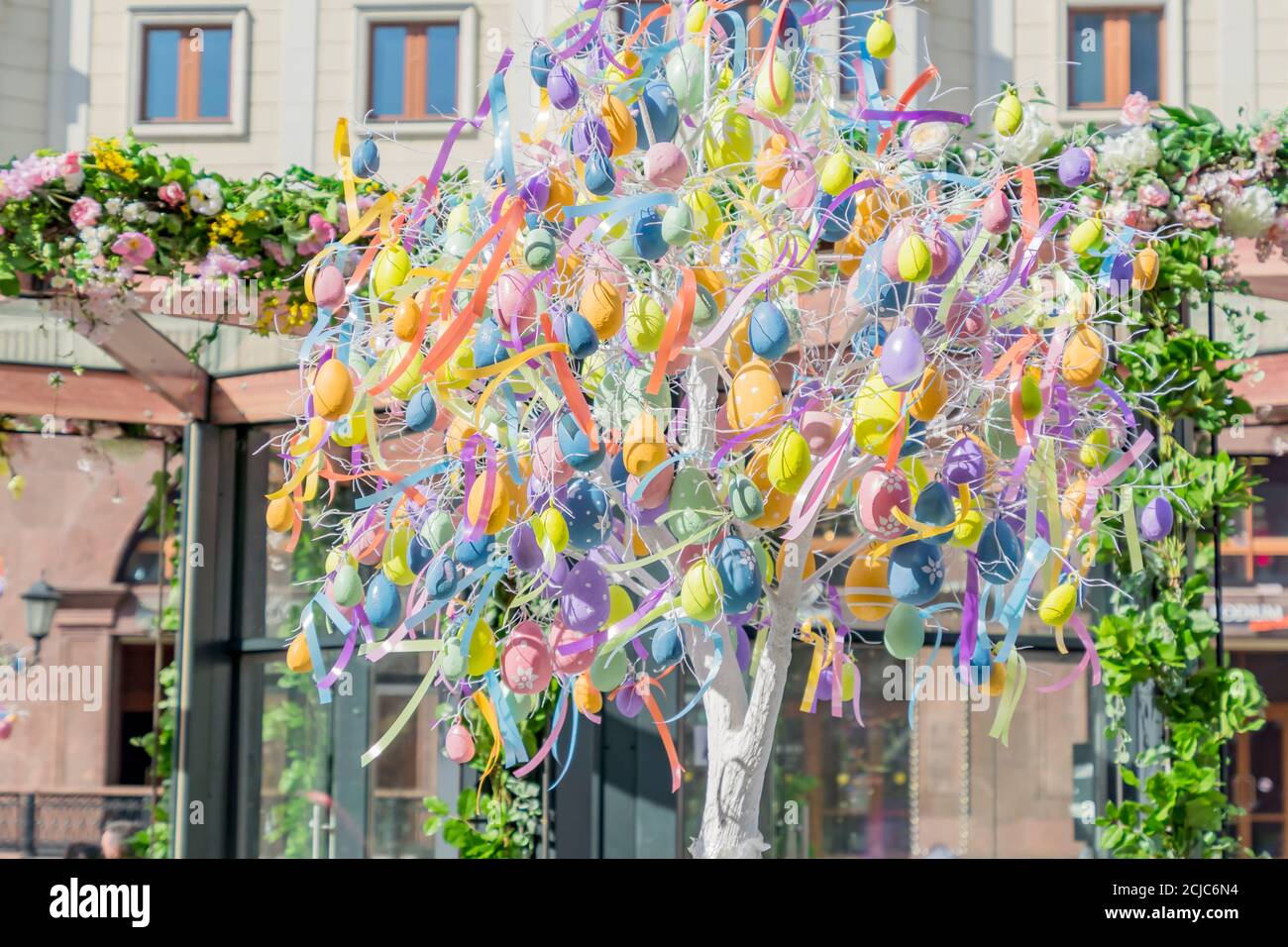 colorfull easter egg tree. brights eggs hanging from branches. Stock Photo