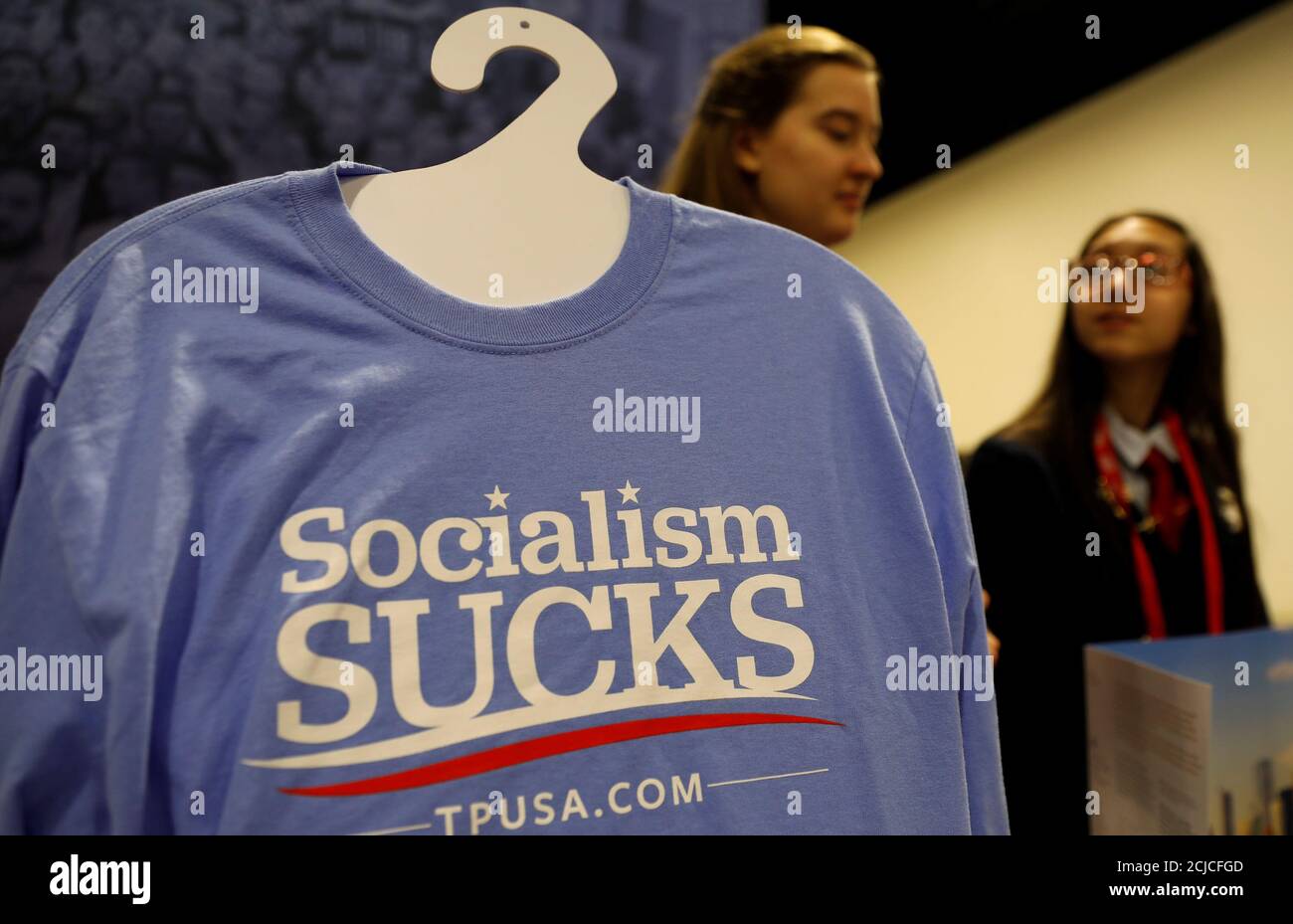 A Turning Point USA booth is tended at the Conservative Political Action Conference (CPAC) at National Harbor, Maryland,  U.S., February 22, 2018.  REUTERS/Kevin Lamarque Stock Photo