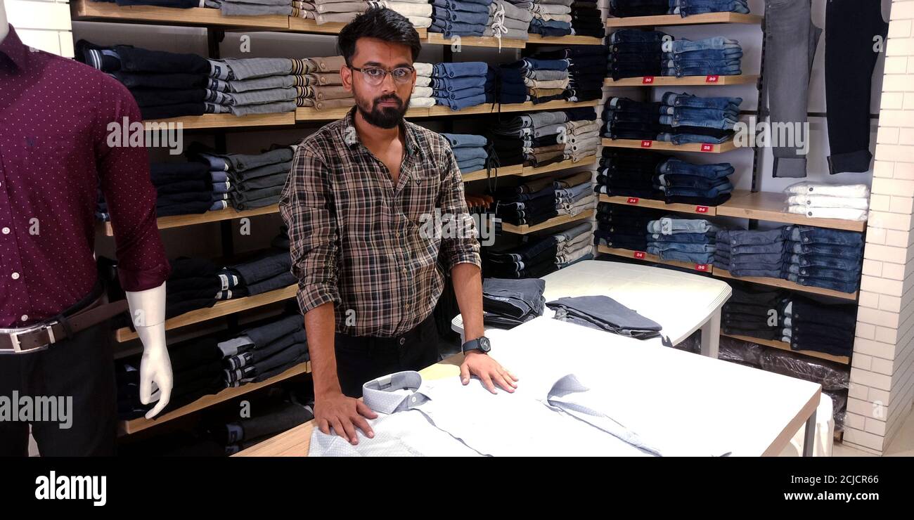 Indian shopkeeper casual clothing hi-res stock photography and images ...