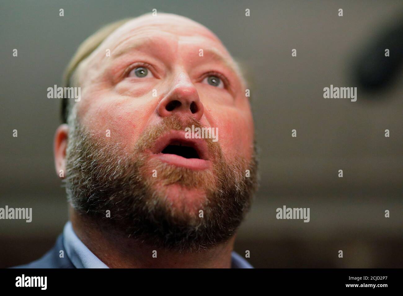 Radio host Alex Jones of Infowars talks to the news media as he arrives to listen to the testimony of Twitter CEO Jack Dorsey and Facebook COO Sheryl Sandberg at a Senate Intelligence Committee hearing on foreign influence operations on social media platforms on Capitol Hill in Washington, U.S., September 5, 2018. REUTERS/Jim Bourg Stock Photo