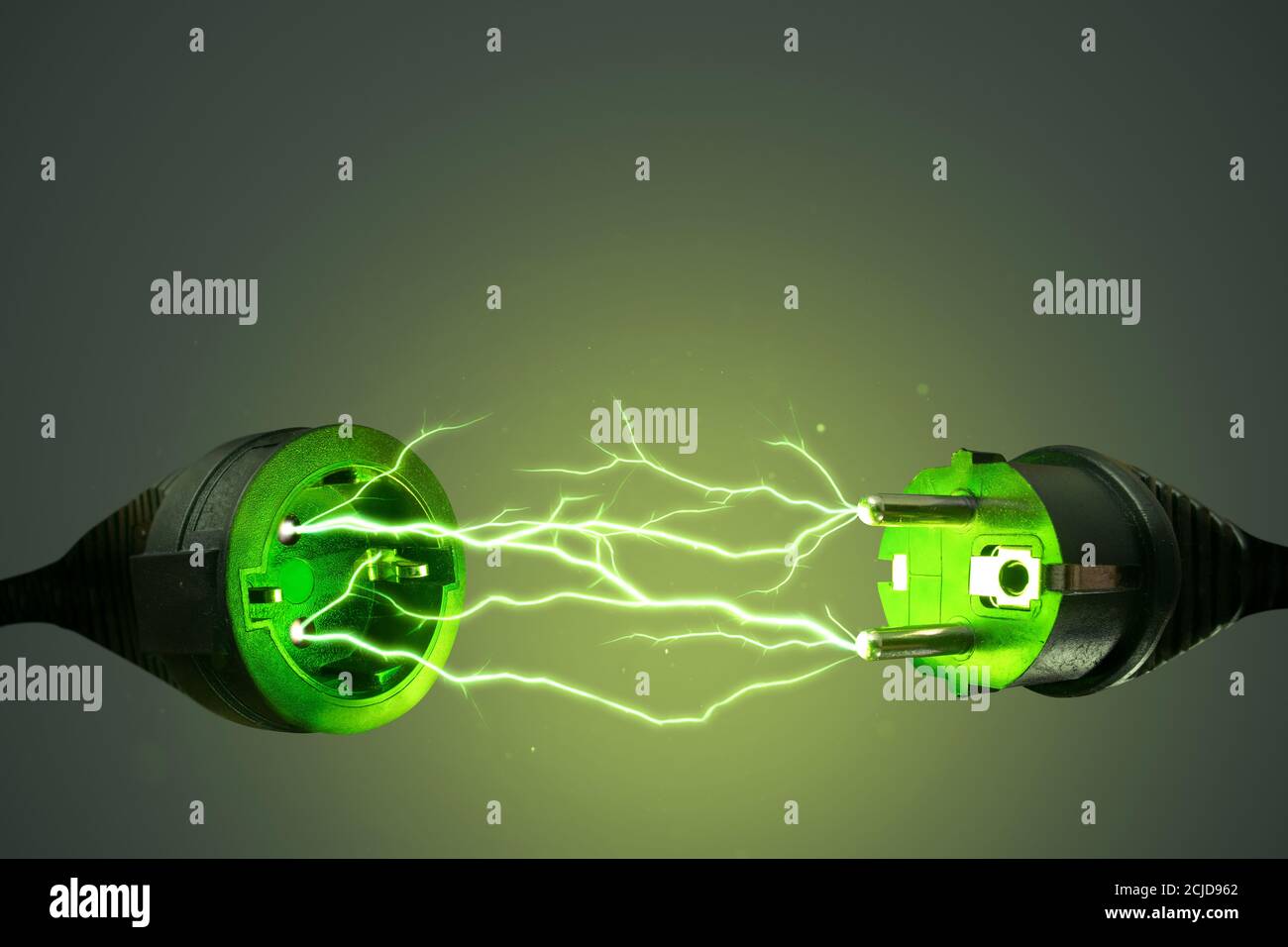 Green energy power plug with electrical lightning Stock Photo