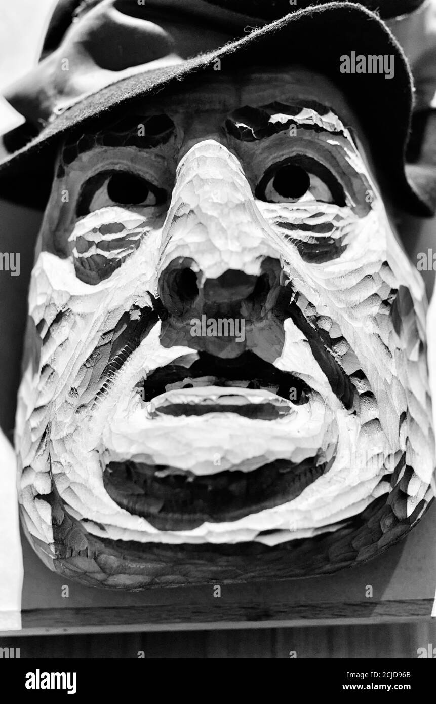 Monochrome concept scary mask of a fat man in the traditional harvest festival in the Baltic countries Stock Photo
