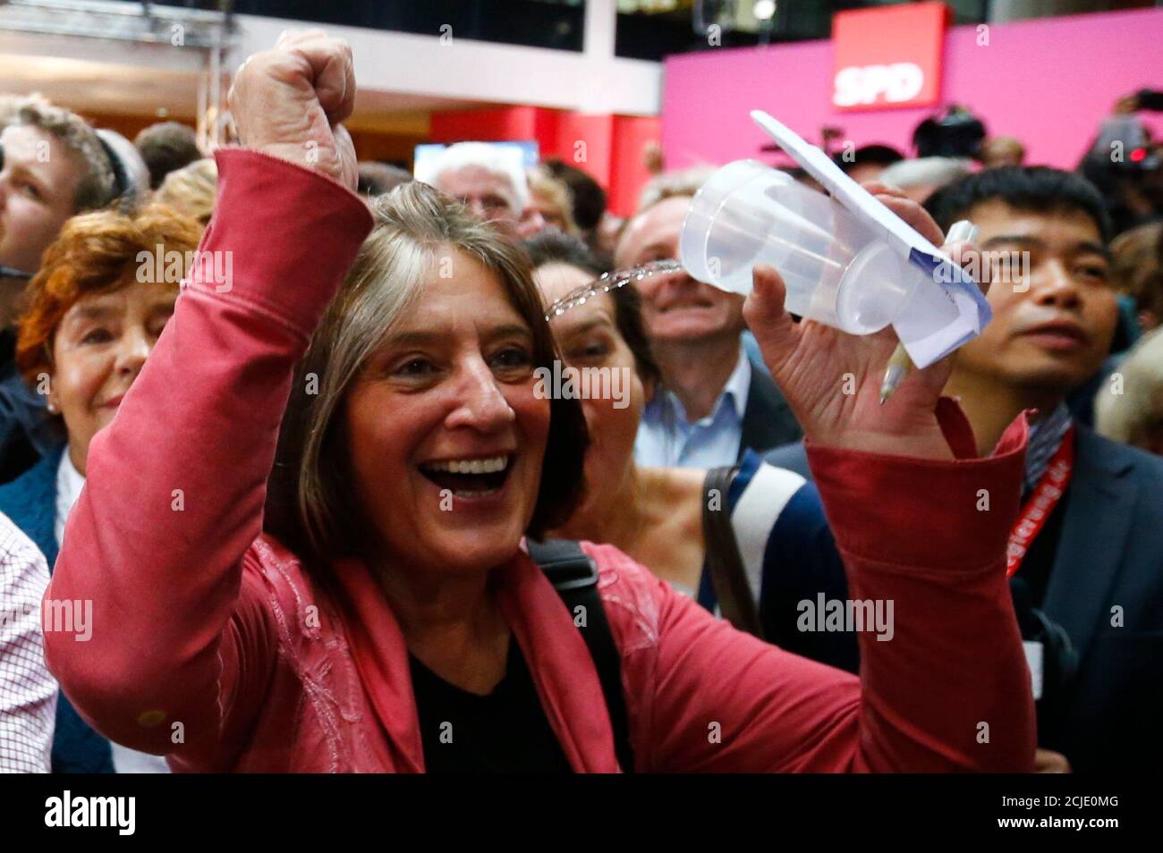 Social Democratic Party (SPD) supporters react to first exit polls in the German general election (Bundestagswahl) at the party headquarters in Berlin, September 22, 2013.  REUTERS/Thomas Peter (GERMANY  - Tags: POLITICS ELECTIONS TPX IMAGES OF THE DAY) Stock Photo