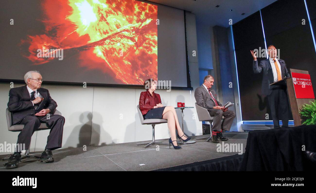 Dr. Thomas Zurbuchen , Associate Administrator for the Science Mission Directorate at NASA (R), speaks as Dr. Eugene Parker, University of Chicago astrophysicist (L), Dr. Nicola Fox, project scientist for the Solar Probe Plus and Dr. Rocky Kolb, from University of Chicago (2nd R), listen during the NASA announcement on its first mission to fly directly into the sun's atmosphere at the University of Chicago in Chicago, Illinois, U.S. May 31, 2017. REUTERS/Kamil Krzaczynski Stock Photo