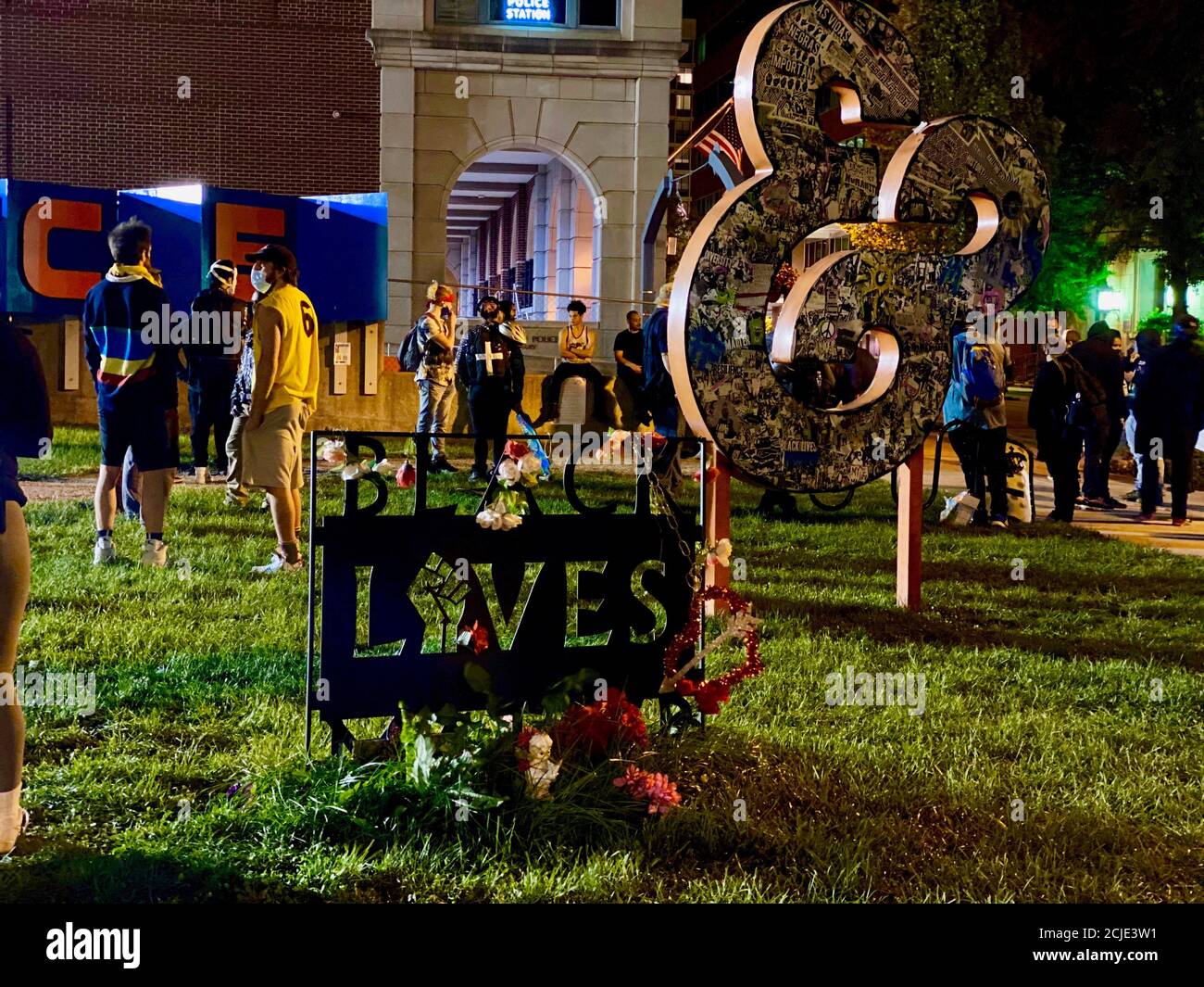 Lancaster, Pennsylvania, USA. 14th Sep, 2020. Second night of protests following Ricardo Munoz's shooting were mostly peaceful, yet at around 1:00 am a protestor shook the fence and called the police names, drawing out a dozens police who arrested one of them. Police also arrested a 16 hour year old an hour or so before this photo. By 2:00 am, most people had gone home. Credit: Amy Katz/ZUMA Wire/Alamy Live News Stock Photo