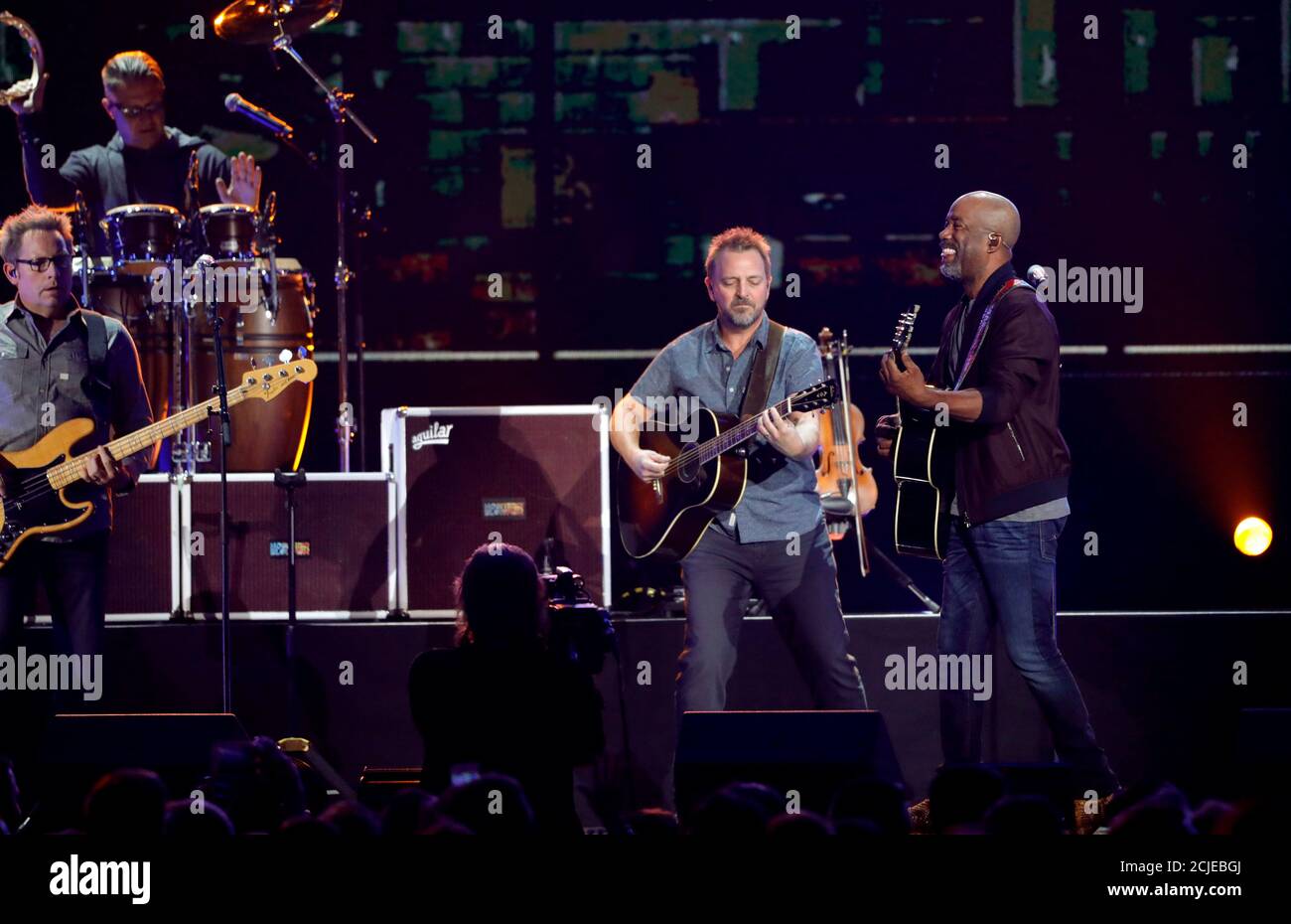 Hootie & The Blowfish lead singer Darius Rucker (R) performs with the
